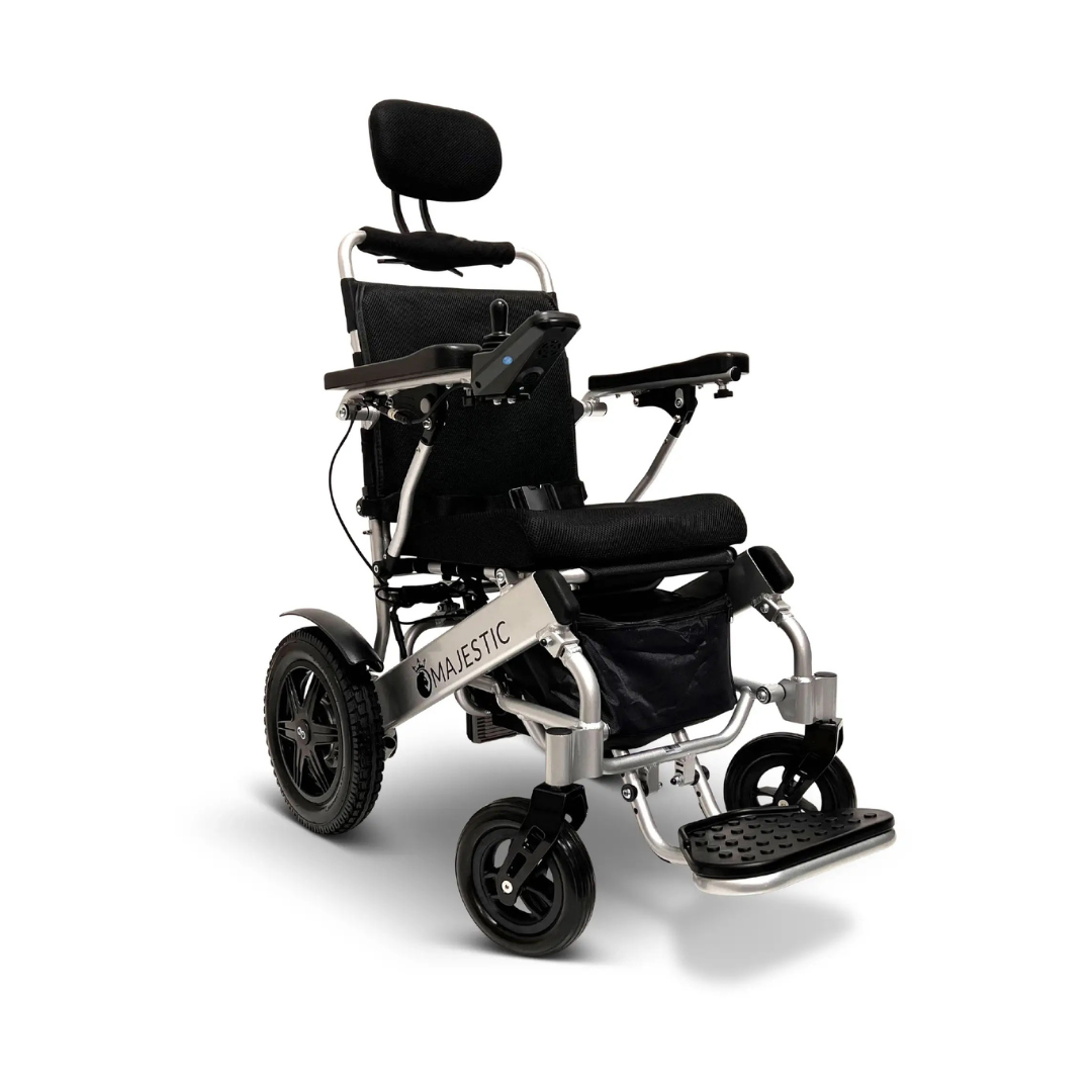 The ComfyGo MAJESTIC IQ-9000 Auto Folding Electric Wheelchair, in black and silver, features cushioned seating with head support, footrests, armrests, brushless silent motors for smooth rides, a digital joystick on the right armrest, and four wheels with larger rear wheels for stability.